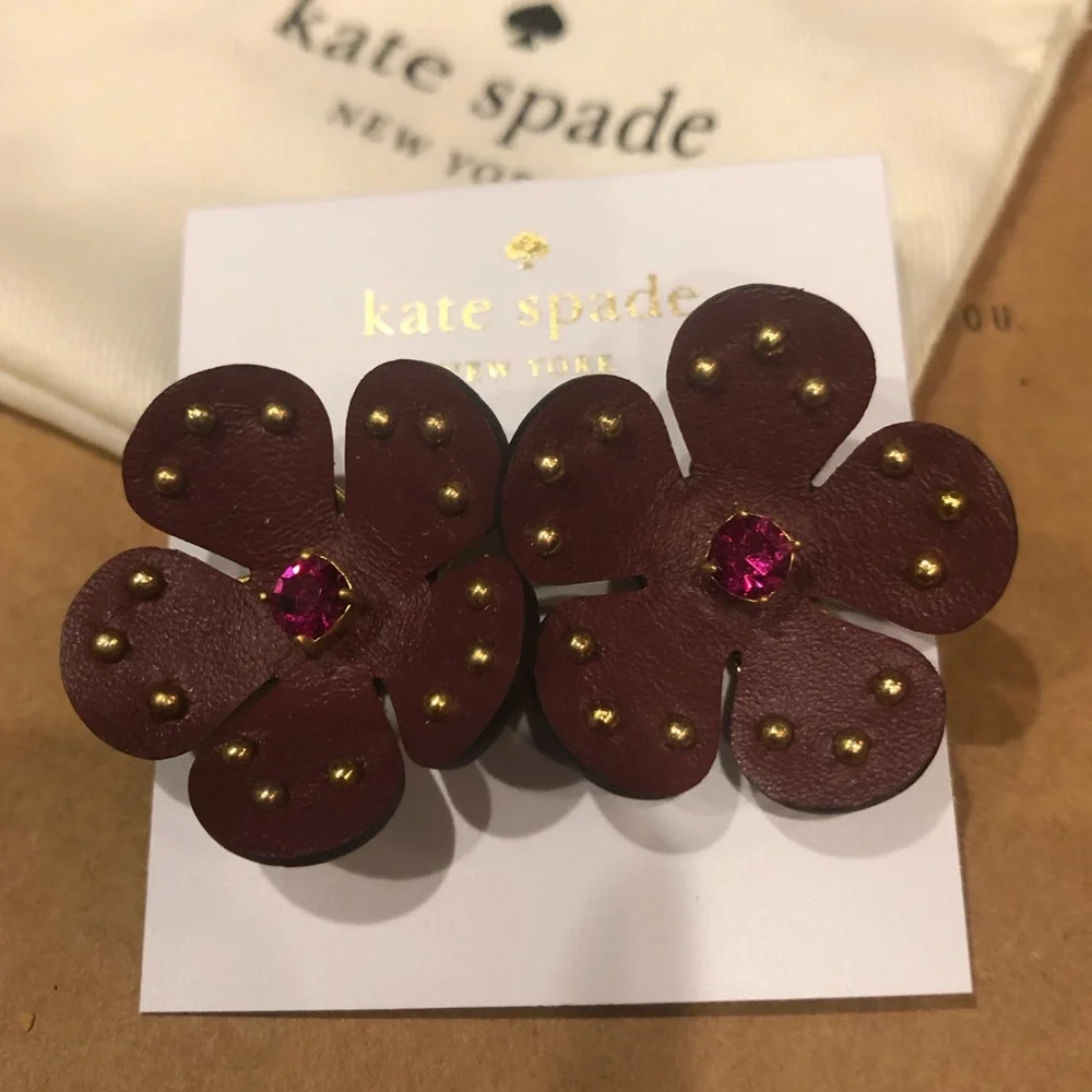 Kate Spade flower earrings. Burgundy leather with pink crystal centers. New!
